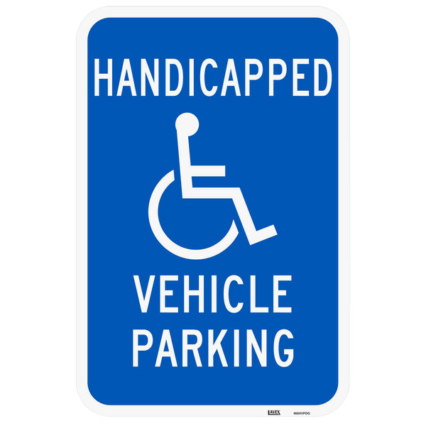 A blue aluminum parking lot sign with white letters that says "Handicapped Vehicle Parking" above a white diamond graphic.
