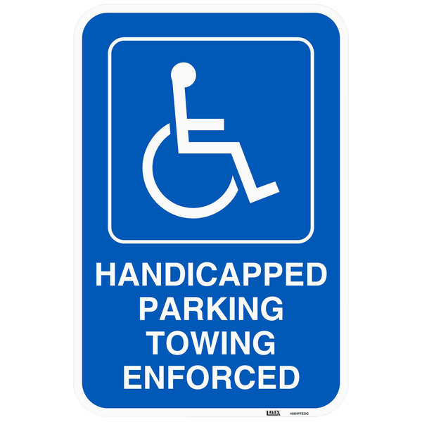 A blue Lavex aluminum sign with a white wheelchair symbol and white text that says "Handicapped Parking / Towing Enforced"