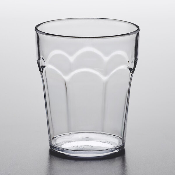 A Choice clear plastic tumbler on a table.