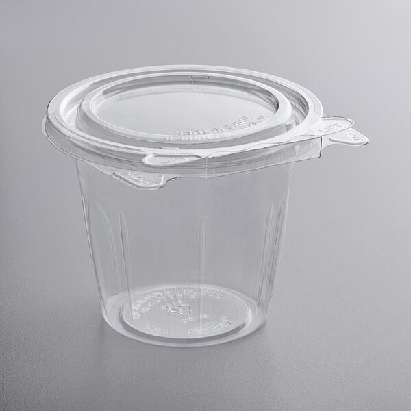 A Dart SafeSeal clear plastic snack container with a flat lid.