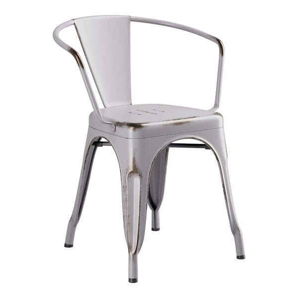 A white metal outdoor arm chair with a white seat and back.