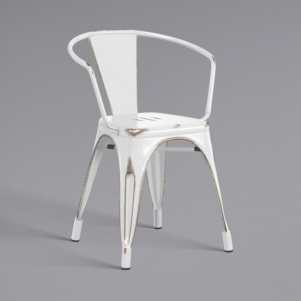 A white metal Lancaster Table & Seating outdoor arm chair.