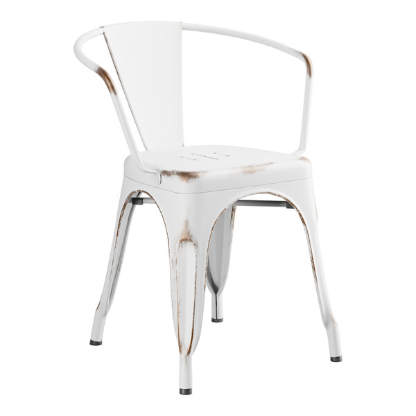 A white metal outdoor arm chair with a brown back and legs.