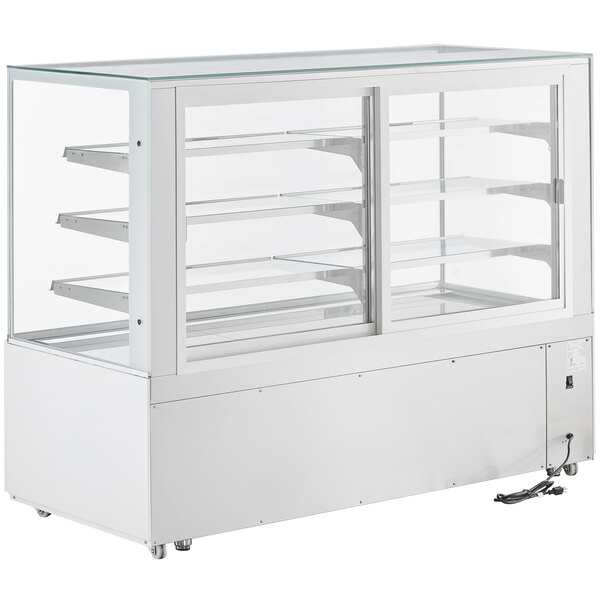 An Avantco white dry bakery display case with glass shelves.