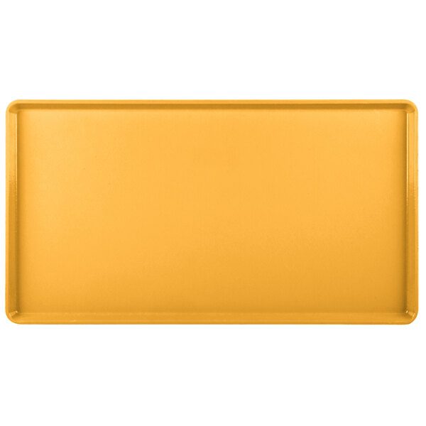 A rectangular yellow Cambro dietary tray.