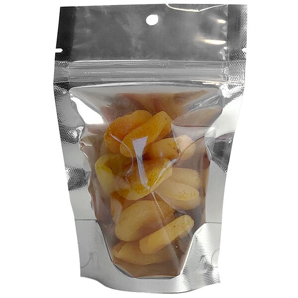 A bag of dried apricots in a Choice clear plastic zip top bag with silver metallized accents.