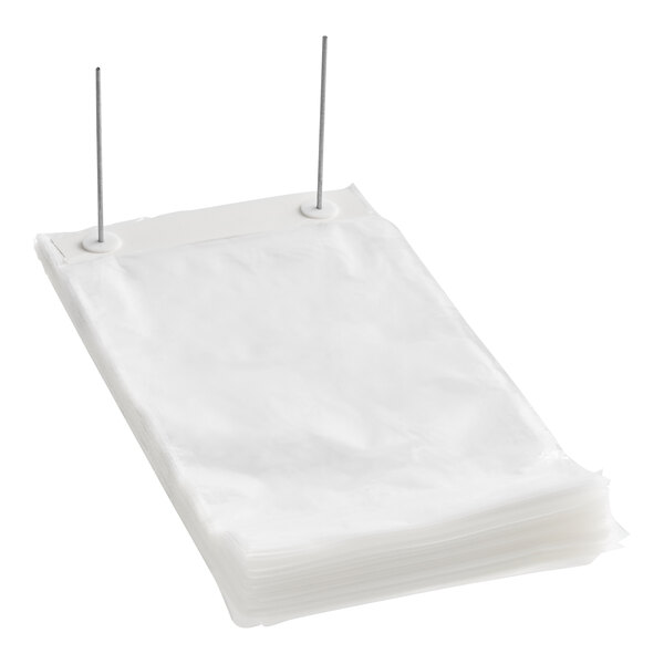 A stack of clear plastic gusseted bread bags on wicket dispenser.