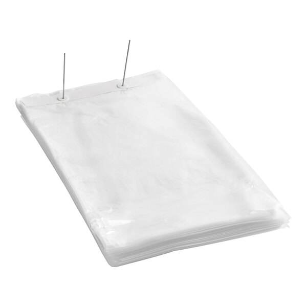 A clear plastic bread bag on a wicket dispenser with metal clips.