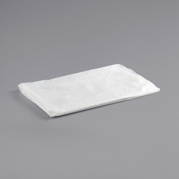 a white plastic bag on a gray surface