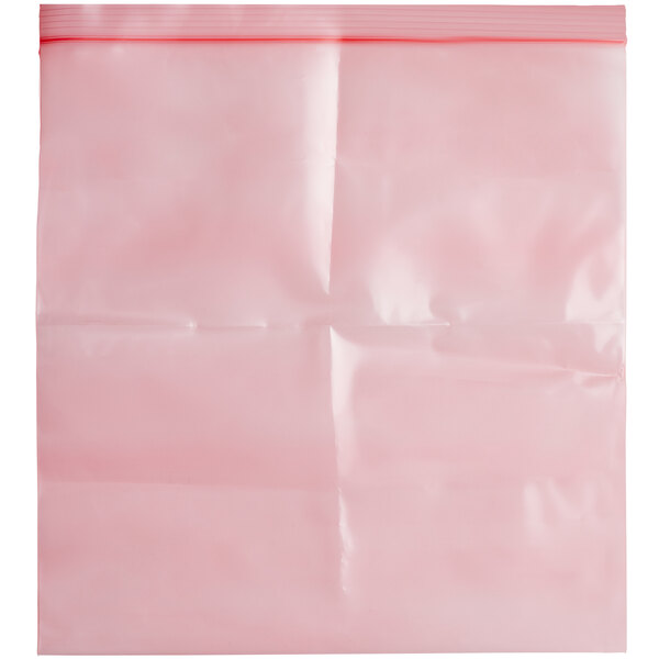 A pink plastic bag with a red zipper.