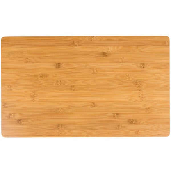 A rectangular bamboo platter with a wood surface.