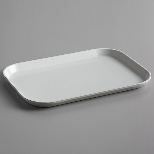 A white rectangular Cambro market tray with a handle.