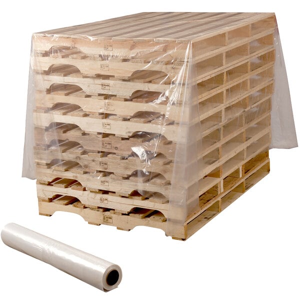 A roll of Lavex clear plastic sheeting covering wooden pallets.