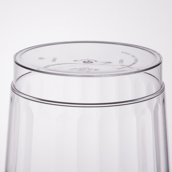 A WNA Comet clear plastic fluted tumbler.