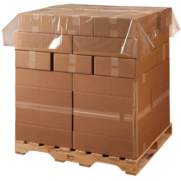 a pallet with many boxes wrapped in plastic