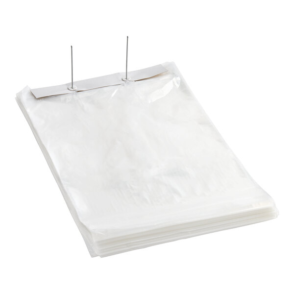 A stack of clear plastic bread bags on metal wicket clips.