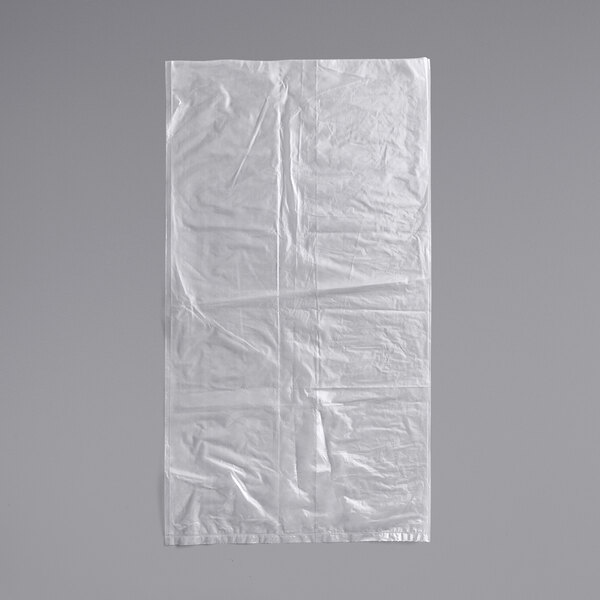 A clear gusseted polyethylene bag on a white surface.