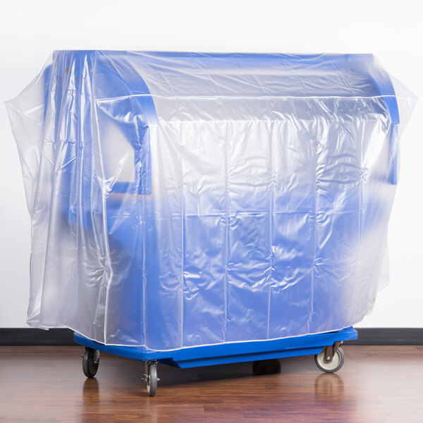 A blue plastic covered cart on wheels.