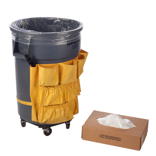 A grey trash can with a yellow Lavex furniture cover over it.