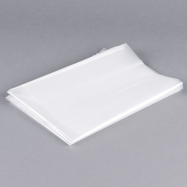 A LK Packaging white plastic food bag on a gray surface.