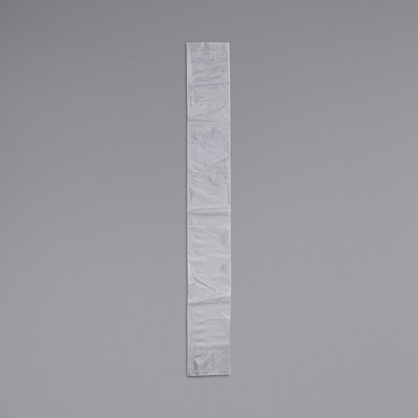 A clear polyethylene layflat bag on a gray background.