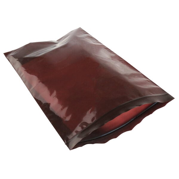 A red polyethylene bag with a zipper and black lining.