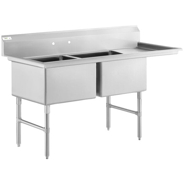 a stainless steel sink with a sink and a faucet