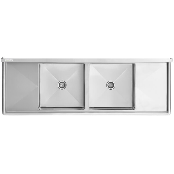 A Regency stainless steel double bowl sink with 2 drainboards.