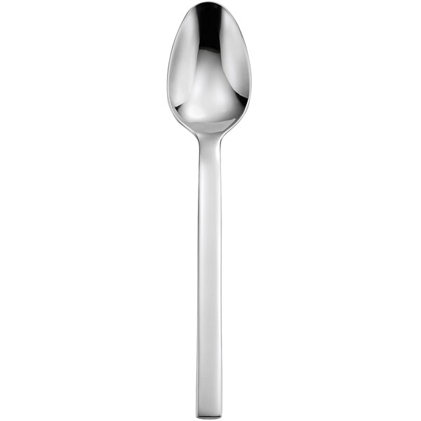 A silver spoon with a white handle.