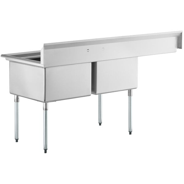 A Regency stainless steel commercial sink with two compartments and a left drainboard.
