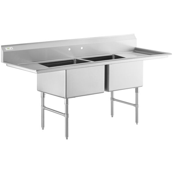 A Regency stainless steel two compartment commercial sink with stainless steel legs and cross bracing.