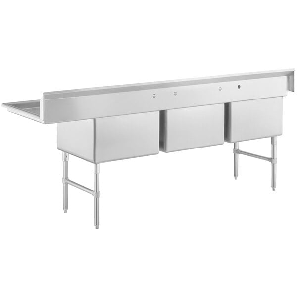 A Regency stainless steel three compartment sink with a right drainboard.