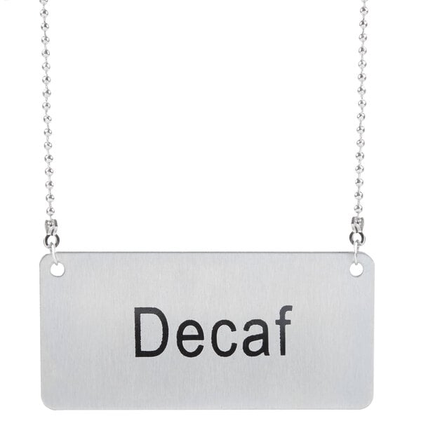 A silver chain with a "Decaf" label attached.