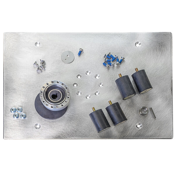 A metal plate with Square Scrub parts on it.