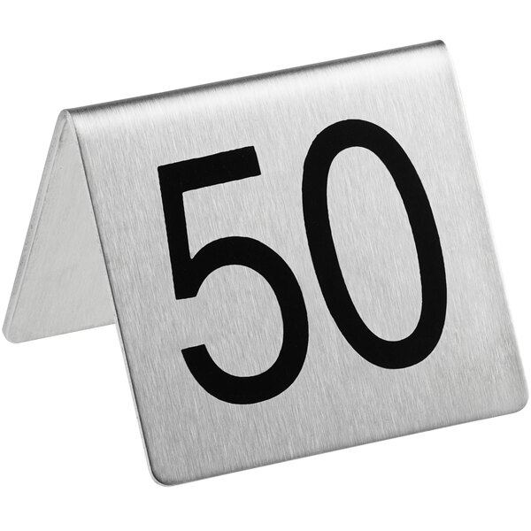 A stainless steel table tent with the number 50 on it.