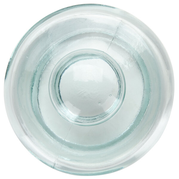 A clear glass lid with a round top.