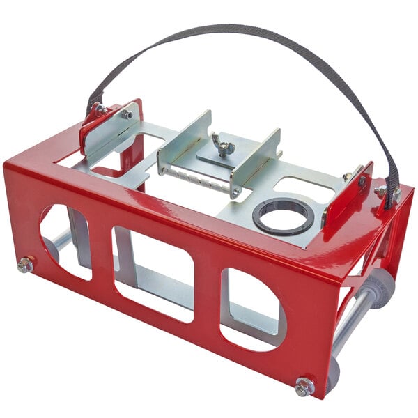 A red and silver metal box with a strap that converts a Square Scrub into a baseboard scrubber.