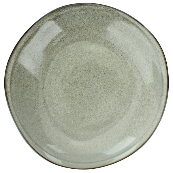 A close up of a white porcelain pasta plate with a brown and gray rim.