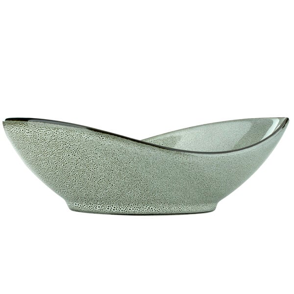 A white oval bowl with a black rim.