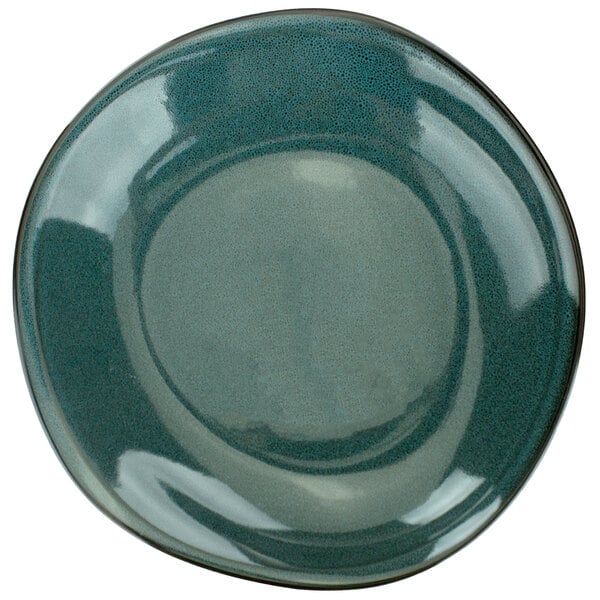 A close up of an International Tableware Luna Midnight Blue Porcelain Rim Bowl.