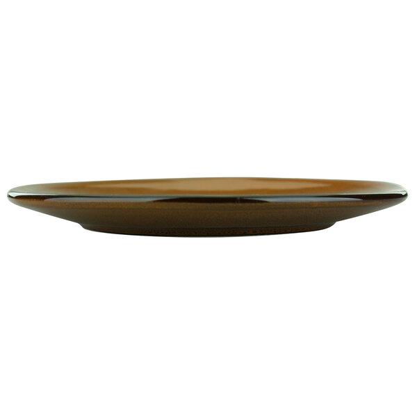 A brown International Tableware Luna terracotta saucer with a rim on a white background.