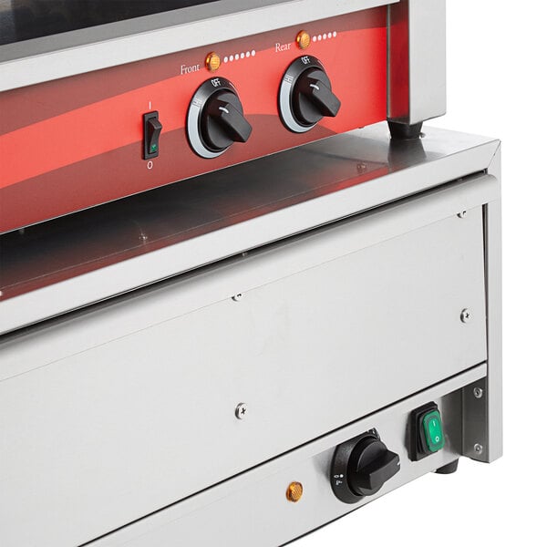 An Avantco commercial hot dog roller grill on a counter with two red buttons.