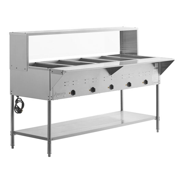 A five-pan open well electric steam table with an undershelf, overshelf, and sneeze guard.