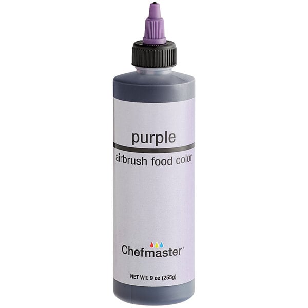 A bottle of Chefmaster purple airbrush food color.