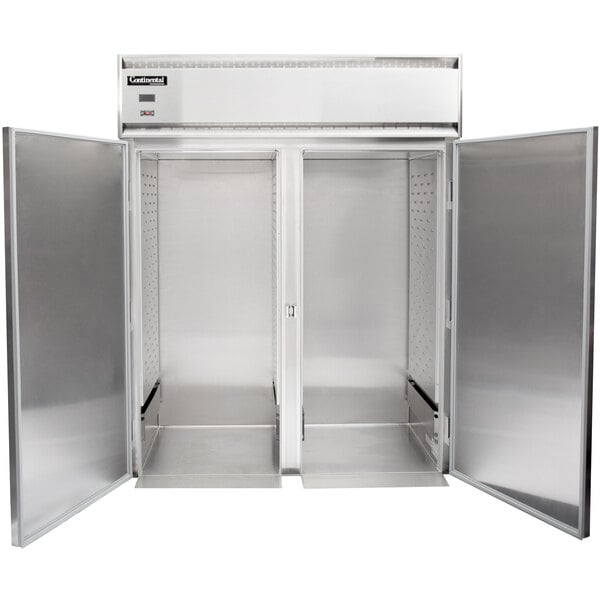 A large silver Continental Refrigerator with open doors.