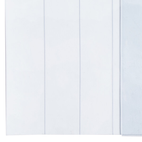 A white rectangular object with a black stripe.