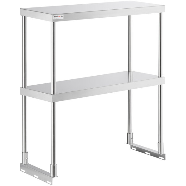 A stainless steel ServIt double overshelf with two shelves on metal legs.