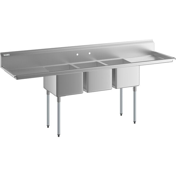 A Regency stainless steel commercial sink with three compartments and two drainboards.