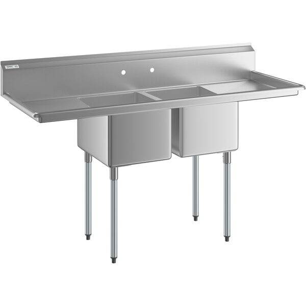 A Regency stainless steel two compartment commercial sink with drainboards.