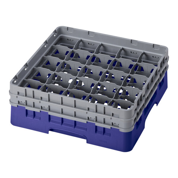 A navy blue plastic Cambro glass rack with 25 compartments.